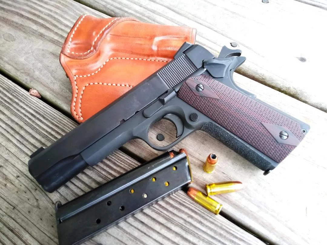 RIA 38 Super with Lobo Gunleather.webp